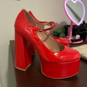 Red dolls kill platform heels